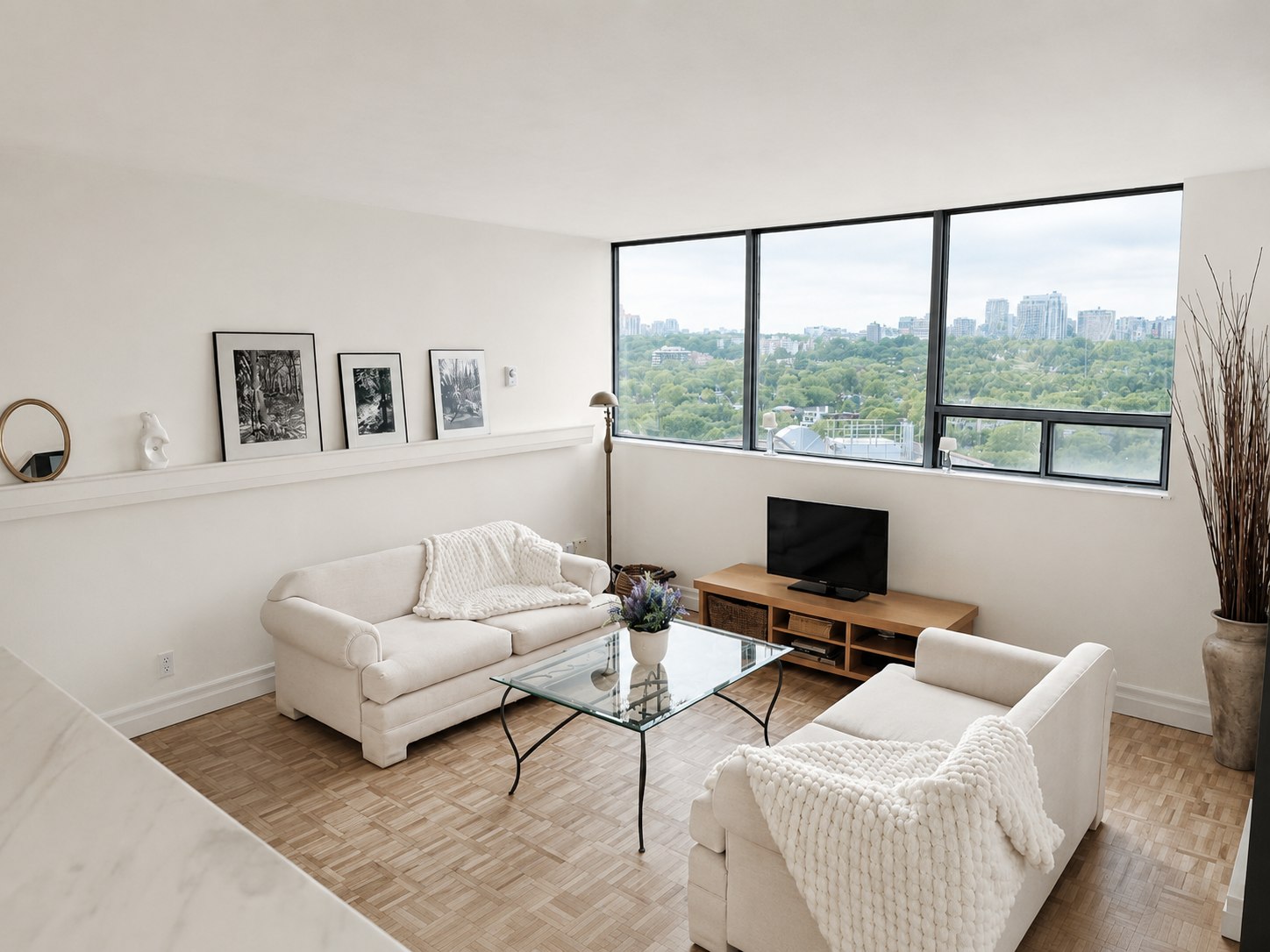Condo living room with panoramic city view
